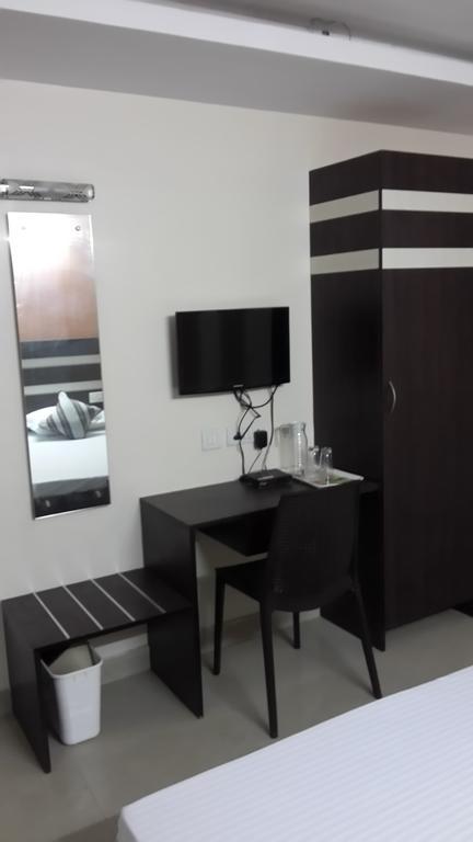 S4 Residency Hotel Csennai Szoba fotó